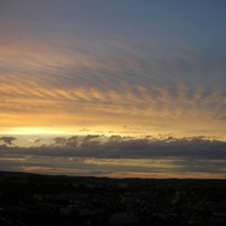 Západ slunce nad Ivančicema z rozhledny Alfonze Muchy
